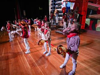 students performing cultural performance