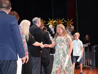 students receiving certificate