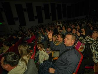 audience in crowd cheering 