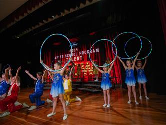 students prepping for talent show